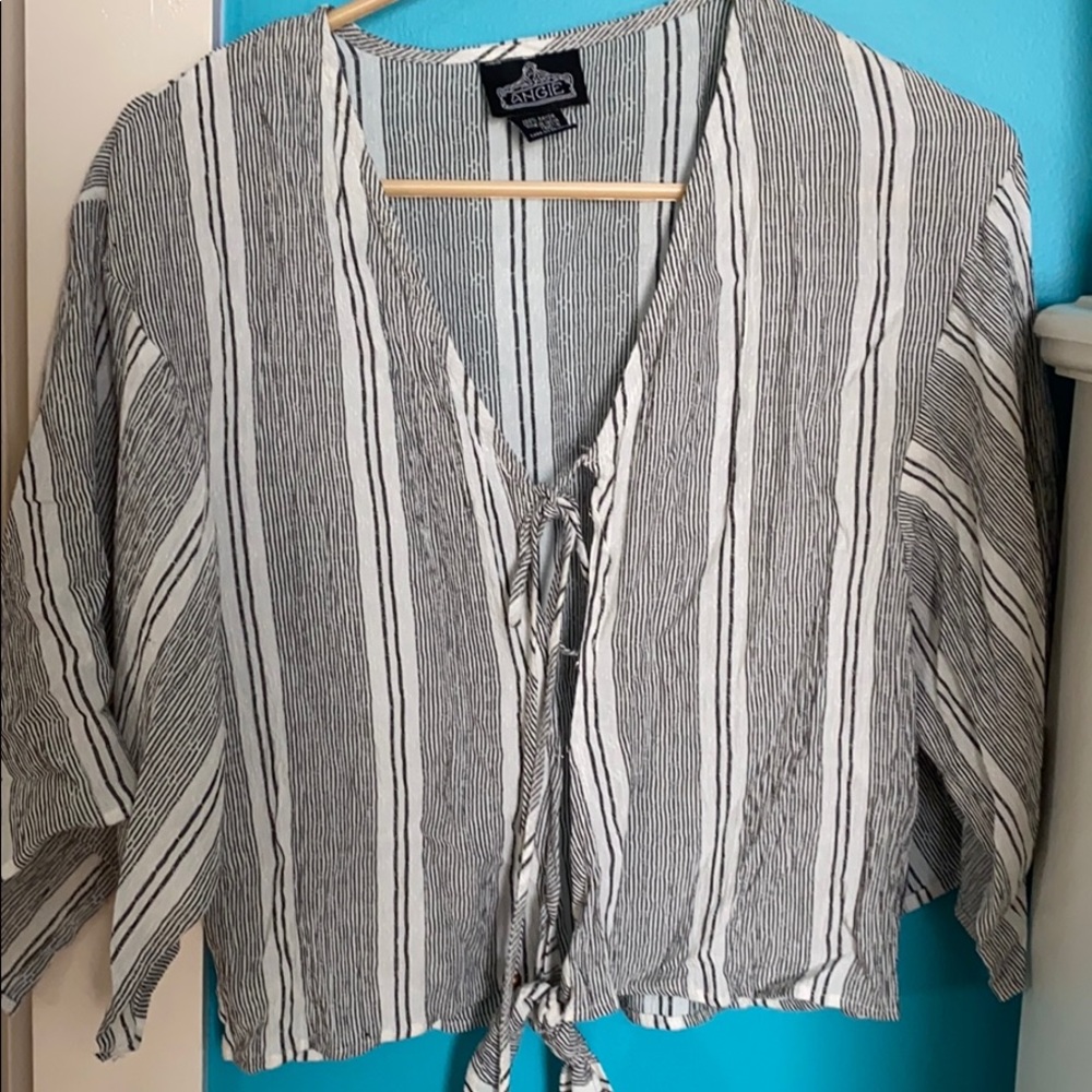 Cute shirt or bathing suit coverup!